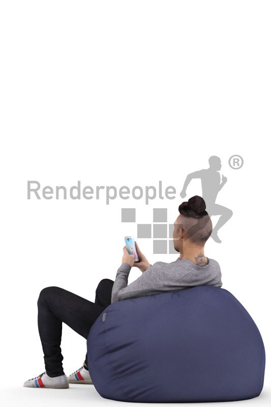 Posed 3D People model for renderings – asian man in daily clothes, relaxing in a beanbag and using his smartphone